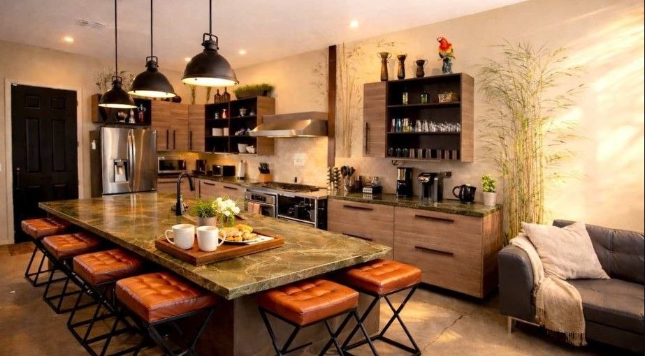 Kitchen with marble island and bar seating